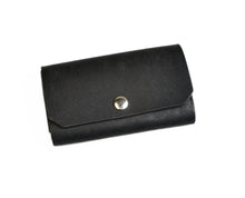 Load image into Gallery viewer, Franklin-Christoph Italian Leather Business Card Case—sleek black flap wallet with silver button, doubles as card holder.