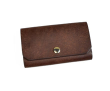 Load image into Gallery viewer, Franklin-Christoph Business Card Case in brown Italian leather with rounded flap and gold snap closure.