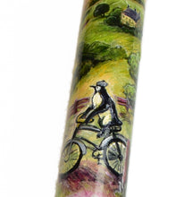 Load image into Gallery viewer, 40 M - A.A. Vacharat - Bicycle Penguin art: a penguin cycles on a path, house and trees behind. Franklin-Christoph pen.