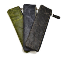 Load image into Gallery viewer, Three Franklin-Christoph Zippered Single Pen Pouches in green, blue, and brown on a white background.