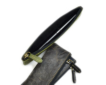 Load image into Gallery viewer, Two Franklin-Christoph Zippered Single Pen Pouches, one open with a black pen, both show visible stitching and zippers.