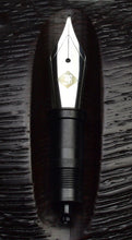 Load image into Gallery viewer, A close-up of a Franklin-Christoph Chen Medium Cursive Italic HPSteel #6 nib unit on textured dark wood.