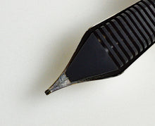 Load image into Gallery viewer, Close-up of a Franklin-Christoph Chen Medium Cursive Italic HPSteel #6 nib, showing grooves, tip, and expert grinding.