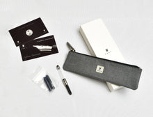 Load image into Gallery viewer, Franklin-Christoph Model 03 Modified Ruby pen, ink cartridges, warranty cards, pen case &amp; box on a white surface.