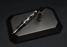 Load image into Gallery viewer, The Franklin-Christoph Model 03M Fiori di Christoph LE FP with silver trim sits atop its black display case.