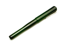 Load image into Gallery viewer, A solid emerald Franklin-Christoph Model 02 Intrinsic fountain pen with a silver clip lies diagonally on white.