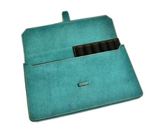 Load image into Gallery viewer, Franklin-Christoph New Penvelope 12: Teal Italian leather pen case with black slots, ideal for stylish organization.
