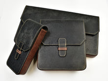 Load image into Gallery viewer, Three New Penvelope 3 pouches by Franklin-Christoph, black Italian leather with brown sides, overlap on white.