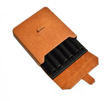 Load image into Gallery viewer, The Franklin-Christoph New Penvelope 6 in Italian leathers holds six pens, displayed in sleek black compartments.