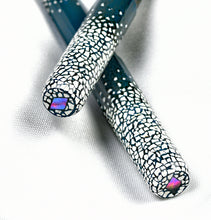 Load image into Gallery viewer, Two Franklin-Christoph Model 03M Rankaku Small Edition pens shown on a textured white surface.