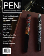 Load image into Gallery viewer, Two Franklin-Christoph City Rain pens on a dark desk, with Pen World Magazine’s cover lines in the background.