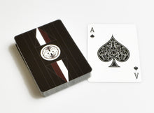 Load image into Gallery viewer, Franklin-Christoph Playing Cards in a black case rest next to an Ace of Spades on a white surface.