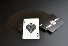 Load image into Gallery viewer, Franklin-Christoph Playing Cards are fanned out on a dark surface, with the Ace of Spades facing up in front.