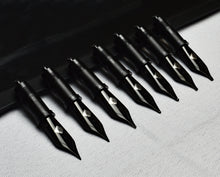 Load image into Gallery viewer, Seven Franklin-Christoph #6 Nib Units arranged diagonally on a textured grey and black background.