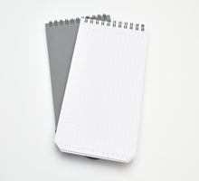Load image into Gallery viewer, Two Franklin-Christoph Reporter Greypads, grey and dotted white, stacked on white, with fountain pen friendly paper.