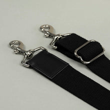 Load image into Gallery viewer, Two black leather straps with metal hooks, perfect replacements for the Franklin-Christoph Duffle Bag - Black Leather.