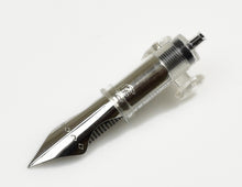 Load image into Gallery viewer, A close-up of Franklin-Christoph #6 Nib Unit’s shiny steel nibs and clear section on a white background.