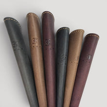 Load image into Gallery viewer, Franklin-Christoph single pen sleeves in boot leather: black, brown, maroon, grey, tan. Features creme stitching and debossed logo.