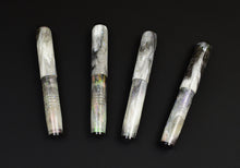Load image into Gallery viewer, pocket 20 fountain pen in semi-translucent ascension wing acrylic in group of 4 with dark background