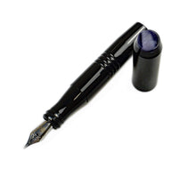 Load image into Gallery viewer, pocket 45 fountain pen with Onyx acrylic and smoke finials. One pen uncapped on a white background. 