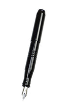Load image into Gallery viewer, pocket 45 fountain pen with Onyx acrylic and smoke finials. One pen with cap posted on a white background. 