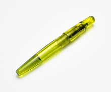 Load image into Gallery viewer, Franklin-Christoph Pocket 66 Fountain Pen—Olivae SE, translucent yellow acrylic, shown on a white background.