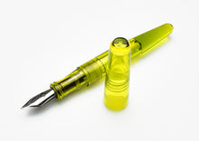 Load image into Gallery viewer, A Franklin-Christoph Pocket 66 Fountain Pen - Olivae SE, cap off, in translucent yellow acrylic, on a white background.