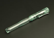 Load image into Gallery viewer, The Franklin-Christoph Model 02 Intrinsic - Antique Glass SE, a #6 nib pen, rests capped on a black surface.
