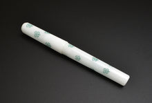 Load image into Gallery viewer, Franklin-Christoph Model 03M 4 Leaf in the Snow pen, snow acrylic, sits diagonally on black background.
