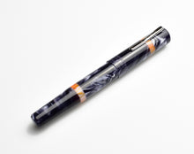 Load image into Gallery viewer, Franklin-Christoph Model 19 Fountain Pen - Smokey Orange SE, #6 nib, silver clip, orange rings on white background.