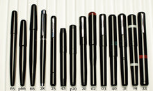 Load image into Gallery viewer, Fourteen Franklin-Christoph pens from the 1 F-C Fountain Pen Comparison are lined up on white for size reference.