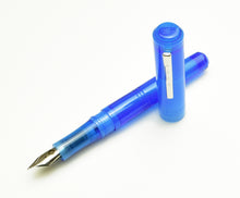 Load image into Gallery viewer, Franklin-Christoph Model 31 Omnis Fountain Pen in Maya Blue acrylic, #6 silver nib, cap beside, on white background.