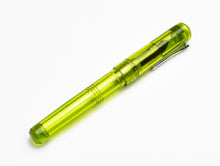Load image into Gallery viewer, A Franklin-Christoph Model 31 Omnis Fountain Pen - Olivae SE with metal clip rests on a white surface.