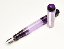 Load image into Gallery viewer, A Franklin-Christoph Model 55 Pentium Lavender &amp; Purpuratum fountain pen rests on a white background.