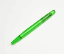 Load image into Gallery viewer, A Franklin-Christoph Model 65 Stabilis Kerry Green SE fountain pen rests diagonally on a white background.