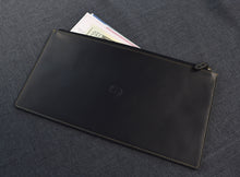 Load image into Gallery viewer, A Franklin-Christoph Bank Bag - Leather holds documents and cash, resembling a classic black bank deposit pouch on fabric.