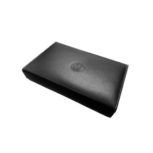 Load image into Gallery viewer, Franklin-Christoph Covered Pen Tray: black leather, white stitching, embossed logo on lid.