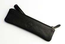 Load image into Gallery viewer, Franklin-Christoph Zippered Single Pen Pouch in black Napa leather, partially open to show a pen, on white background.