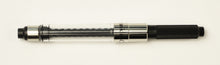 Load image into Gallery viewer, Franklin-Christoph Fountain Pen Converter—an elegant black and silver piston converter for your favorite pen.