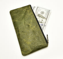 Load image into Gallery viewer, Franklin-Christoph’s Currency Case - NWF Olive Green holds $100 bills, shown against a white background.