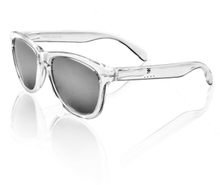 Load image into Gallery viewer, Franklin-Christoph Sunglasses with clear frames and grey lenses, angled on a white reflective surface.