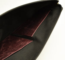 Load image into Gallery viewer, Franklin-Christoph Gear Bag open to show two dark brown leather pockets inside black zippered organizer.