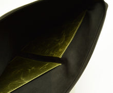 Load image into Gallery viewer, Open Franklin-Christoph Gear Bag with two greenish-yellow interior pockets and visible stitching detail.