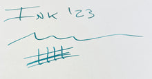 Load image into Gallery viewer, A page with Franklin-Christoph Ink ’23 1oz, a blue squiggle and crossed grid on white paper from the Philly Show.