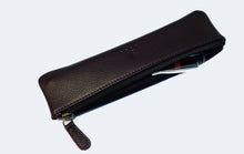 Load image into Gallery viewer, A Franklin-Christoph Zippered Single Pen Pouch in brown Napa leather, slightly open to reveal a black and red pen.