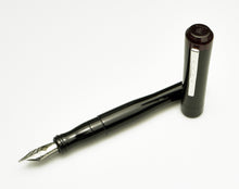 Load image into Gallery viewer, Franklin-Christoph Model 02 Intrinsic Fountain Pen in Black &amp; Cinnamaroon with #6 nib, shown uncapped on white.