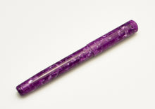Load image into Gallery viewer, A closed Franklin-Christoph Model 20 Marietta Pearlple pen lies diagonally on a plain white background.