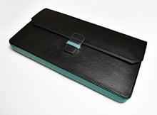 Load image into Gallery viewer, Franklin-Christoph New Penvelope 12 leather case in black with teal trim, shown closed—a stylish pen storage solution.