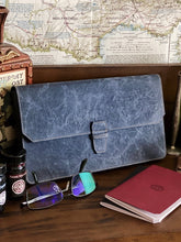 Load image into Gallery viewer, Franklin-Christoph New Penvelope 12 NWF on desk with glasses, red notebook, map, and removable pen inserts inside.
