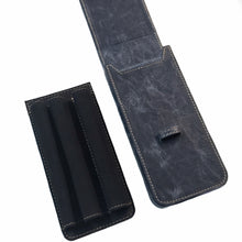 Load image into Gallery viewer, Two black Franklin-Christoph New Penvelope 3 NWF cases; one open, showing three removable pen slots inside.